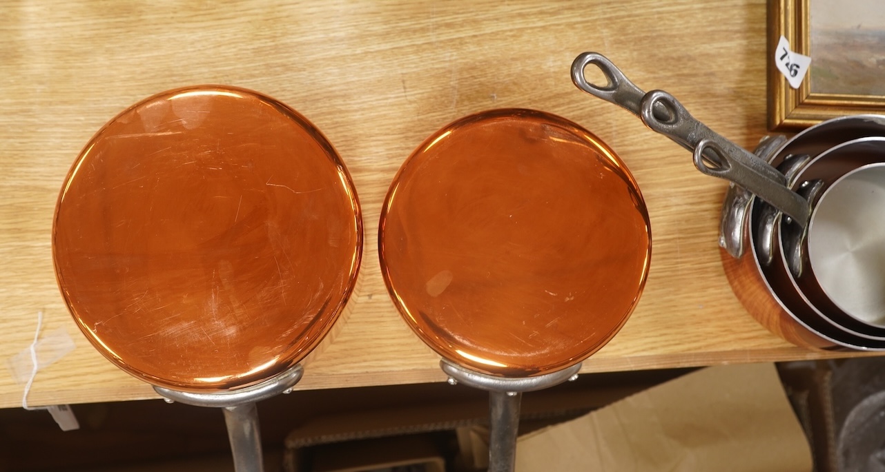 A set of five French graduated iron handled copper saucepans, largest 18.5cm diameter. Condition - good